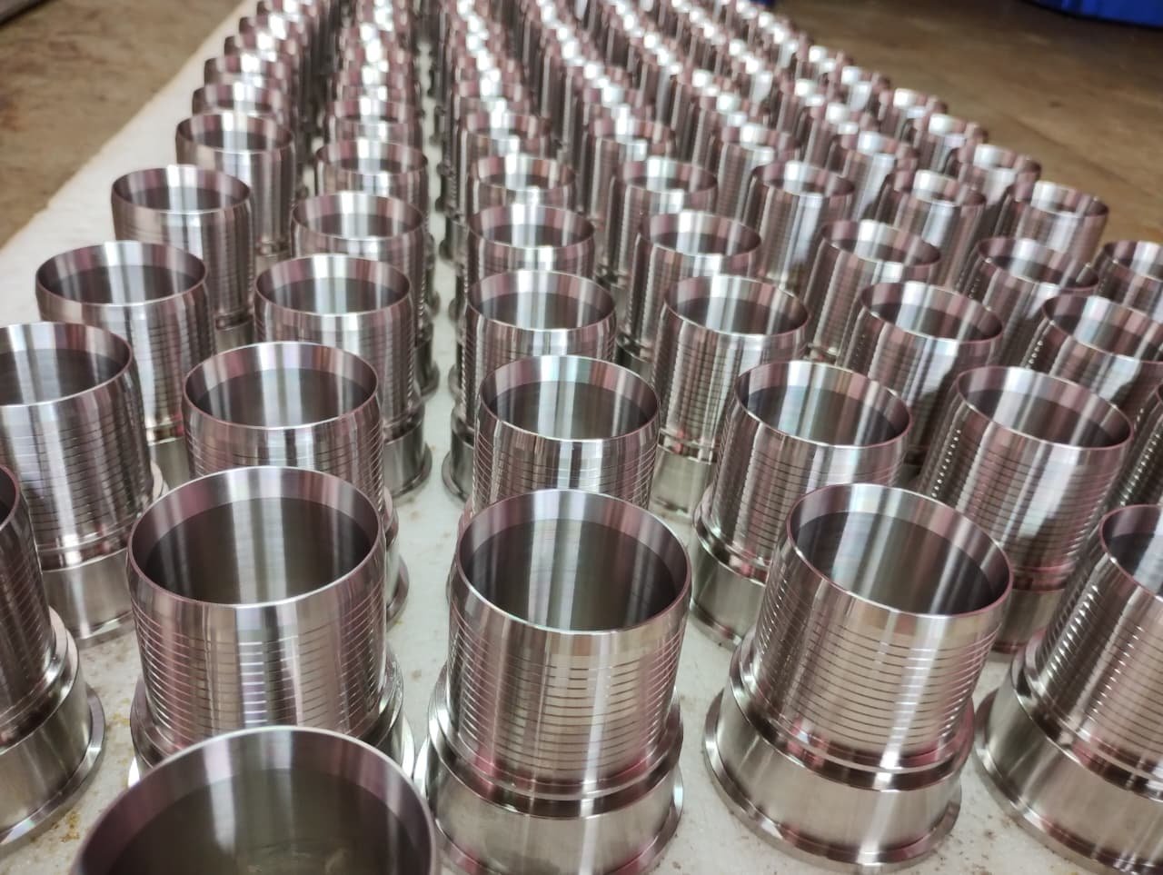 A production batch of stainless steel CNC-turned components